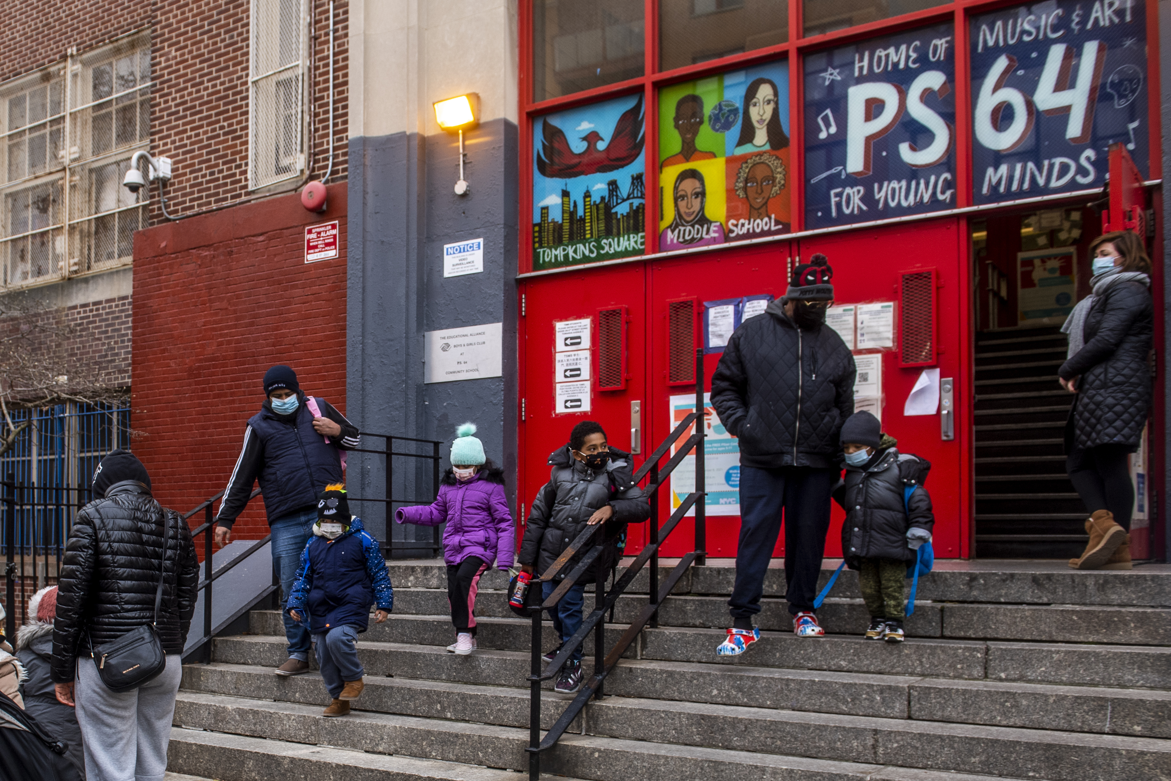 As Omicron Surges, Schools Battle Pressure to Stay Open