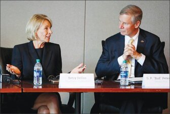 During her tour, DeVos met with Georgia Tech President G. P. “Bud” Peterson, above, and promoted a new mobile app that’s aimed at streamlining the financial aid application process.