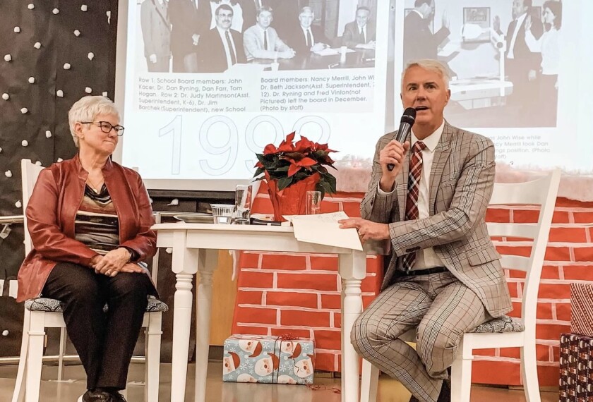 Retired superintendent Mike Nelson and school board member Nancy Merrill engage in a Q&A for community members.