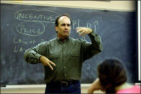 Brett Burkey makes a point during his economics and history course.