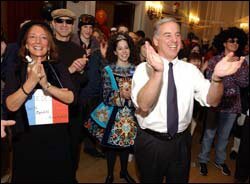 Democratic presidential candidate Howard Dean enjoys a skit parodying his stump speech at a Halloween party in Manchester, N.H.