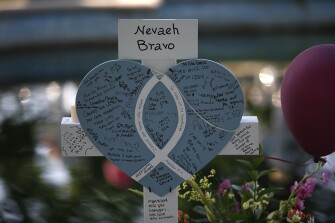 Nevaeh Bravo's cross stands at a memorial site for the victims killed in this week's shooting at Robb Elementary School in Uvalde, Texas, Friday, May 27, 2022.