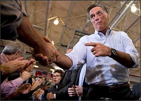 Republican presidential candidate Mitt Romney shakes hands during a campaign rally on Sept. 7 in Orange City, Iowa.
