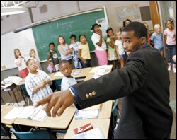 Hayward Jean, a second-year teacher and a graduate of the Call Me MISTER program, goes over a few rules with his students before they head out to lunch. Jean teaches 3rd grade at Greendale Elementary School in New Ellenton, S.C.
