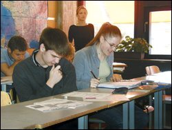 10th graders review their work. Finnish students of varying abilities are grouped together in classes.