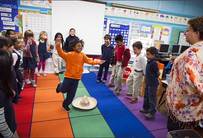 After reading a story about a Mexican hat dance, 1st grader Ethan Wheeler tries out the dance himself at the Wharton K-8 Dual Language Academy in Houston, one of the oldest schoolwide dual-language programs in the country. Dual-language programs—in which teachers split instruction between English and another language—are growing in popularity nationwide.