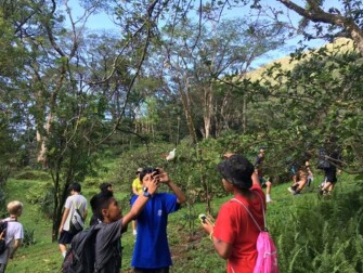 Image of children learning outdoors