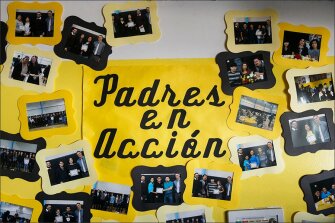 A poster pays tribute to parents who have become actively involved in their child’s education at Alliance Collins. The school serves mostly low-income, Latino students.