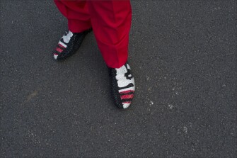 Decorated cowboy boots are modeled on the streets of Cleveland.