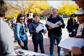 Supporters of Amendment 66 review campaign materials at a rally in Wheat Ridge, one of the Denver suburbs considered crucial to the plan's success.