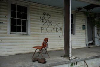 A home in New Orleans' Lower 9th Ward remains mostly untouched 10 years after Hurricane Katrina.