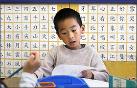 Aaron Ko, 6, studies in a Cantonese immersion classroom at West Portal Elementary School in San Francisco. A statewide measure on the November ballot would reverse nearly two decades of restrictions on bilingual education programs in California’s public schools.