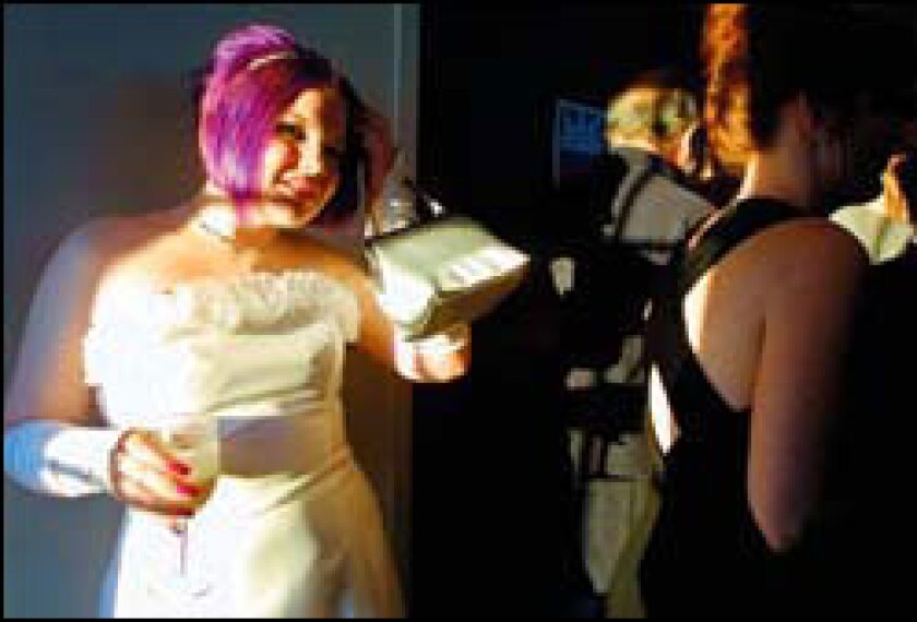 Lauren Mayer, above, attends a prom for gay, lesbian, bisexual, and transgender youths.