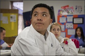 YES Prep 10th grader Angel Leon, shown in class, says of the school, “It’s a lot of work, but you get help if you don’t understand it.”