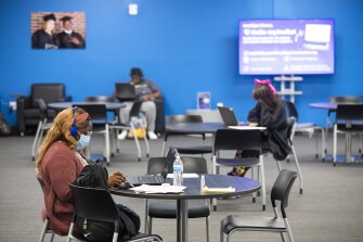 Tiara Taylor, a school counselor for Lowcountry Acceleration Academy, sits at desk in the school space doing work in-between sessions in North Charleston on Tuesday, August 9, 2022.