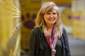 Principal Tamara McWilliams stands in the hallway at Ozona Middle School in Ozona, Texas. She is the principal of the only elementary and middle schools in the rural town, with a population of just over 3,200.