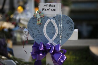 Alithia Ramirez's cross stands at a memorial site for the victims killed in this week's shooting at Robb Elementary School in Uvalde, Texas, Friday, May 27, 2022.
