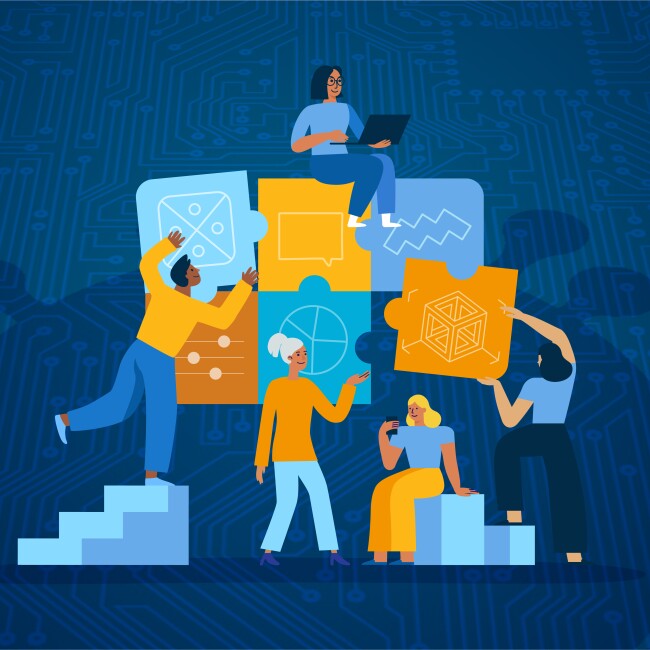 A diverse team works together to solve a technology puzzle