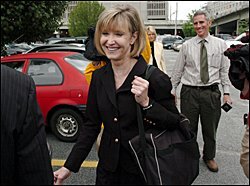 Former Georgia schools superintendent Linda Schrenko walks out of federal court in Atlanta on May 10. Ms. Schrenko, who pleaded guilty to fraud and money laundering, will serve eight years in prison as part of a plea bargain.