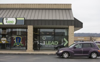 The iLEAD Academy is located a few doors down from a grocery store in a Carrollton, Ky., shopping center, and in front of the local Walmart.