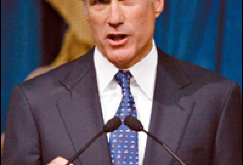 Massachusetts Gov. Mitt Romney gestures during his State of the State Address in Boston on Jan. 13. Though the Republican is seeking more aid for schools in this year's legislative session, he said in his speech that money alone will not close academic- achievement gaps in urban areas.
