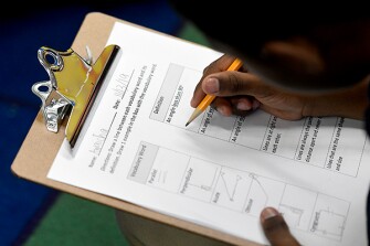 Second grader Awaicha Tafah, works on his architecture assignment in the Emerging Scholars program. Students who show academic potential in the program can be referred to the Center for Talented Youth at Johns Hopkins University.