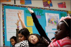 From right, 4th graders Rachel Quansah, Erika Giang, Prashanthi Rajesan, and Winta Solomon try to predict what will happen in the next chapter of the novel Holes during class at Discovery Public School.