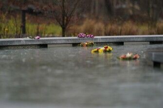 Flowers adorn a memorial to the victims of the Sandy Hook Elementary School shooting, in Newtown, Conn., Sunday, Nov. 13, 2022.