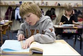 Teacher-developed assessments taken by students such as 4th grader Jacob Moyer are the linchpin of Nebraska's one-of-a-kind accountability system.