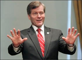 Virginia Gov. Robert F. McDonnell talks with state lawmakers at the state capitol in Richmond last month. He won several legislative victories.