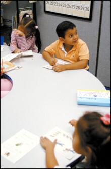 Five-year-old Merrick Jansen and classmate tackle worksheets in the Junior Kumon program at a tutoring center in Rockville, Md.