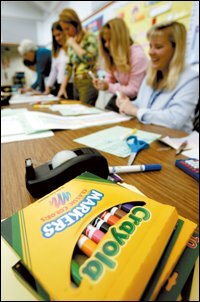 Teachers at Shoal Creek Elementary School in Poway, Calif., work on plans for team-teaching students based on the analysis of testing data.