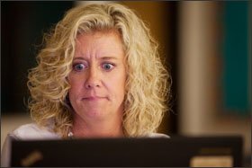 Teacher Jane Langan follows along Ms. Webb's training session on her laptop.