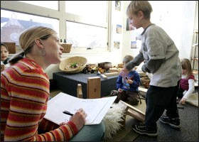 Teacher Anna Bartholome monitors pupils at MacDonald Montessori School in St. Paul, Minn. The school blends principles of Italy's Reggio Emilia preschools into the curriculum, a task the Minnesota school's founder likens at times to a "rocky marriage."