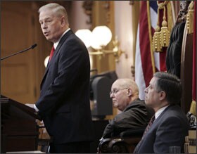 Ohio Gov. Ted Strickland gives his State of the State address to the legislature last week as Senate President Bill Harris, center, and House Speaker Armond Budish look on. He said economic-stimulus aid helped Ohio avoid education cuts in a tough economy.