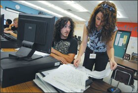 Michael J. Greene, 18, left, spent the spring in the "Apex lab" run by teacher Kim Feltner, right, at Pine Ridge High School in the Volusia County, Fla., district.