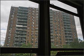 The Riverview Towers, a low-income housing complex, looms over Public School 28, which houses the gifted-and talented academy. The school is located in one of Paterson’s most impoverished neighborhoods.