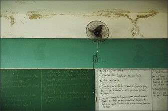 Mold has infested the wall and the ceiling is decaying from water damage in a classroom at Guillermina Rosado De Ayala school in Loiza, Puerto Rico.