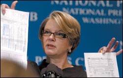 Secretary of Education Margaret Spellings compares the complexity of stduent financial-aid applications to federal tax forms during a speech last week.
