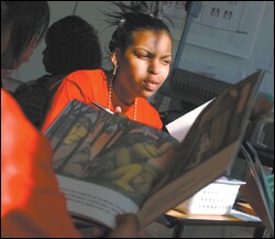 Rinada McBean, an 8th grader at a Knowledge is Power Program school in Washington, works on her Spanish.