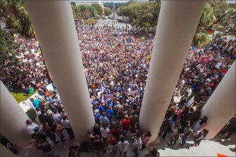 Protesters rally against gun violence on the steps of the old Florida Capitol in Tallahassee on Feb. 21, the one week anniversary of the deadly shooting at Marjory Stoneman Douglas High School.
