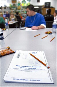 Sophomores await the start of a state test recently at Federal Way High School in Washington state. With testing programs booming, educators are struggling to manage and make use of the growing volume of data.