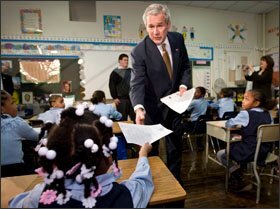 President George W. Bush collects letters from students at General Philip Kearny School in Philadelphia on Jan. 8, the seventh anniversary of the No Child Left Behind Act.