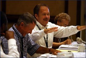 CHRISTOPHER STEINHAUSER: The superintendent of the Long Beach schools gestures during a meeting of the school board last month. He is now in his 26th year of employment with the district.