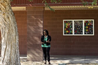 Dr. Adama Sallu stands for a portrait at Conley Elementary School on Friday, Feb. 26, 2021, in Chandler, Ariz..