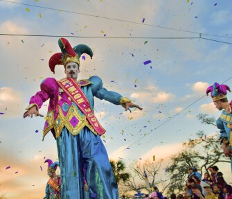 The many parades of Mardi Gras season are used as recruitment venues in New Orleans’ choice-driven public education landscape.