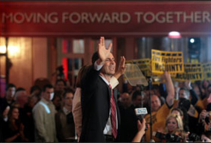 Ontario Premier Dalton McGuinty waves to supporters following his party’s re-election victory earlier this month. Under his leadership, education has been a high priority for the province.