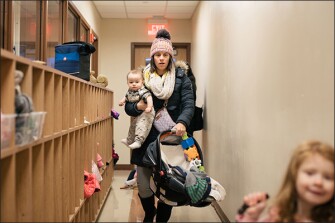 Kristin Delahanty brings her son Nathan, 7 months, and her daughter Norah, 4, to the Children’s Learning World Montessori at Niles North High School, where her husband teaches. The teachers’ union and the district partnered to start the day-care program there.