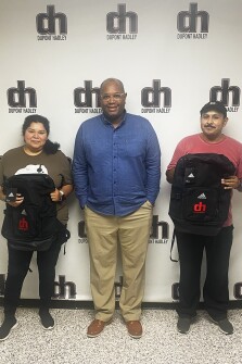 Ana Gil, custodian at DuPont Hadley Middle in Nashville, Tenn., with Kevin Armstrong, the school’s principal, and Miguel Ribera, also a custodian at the school.
