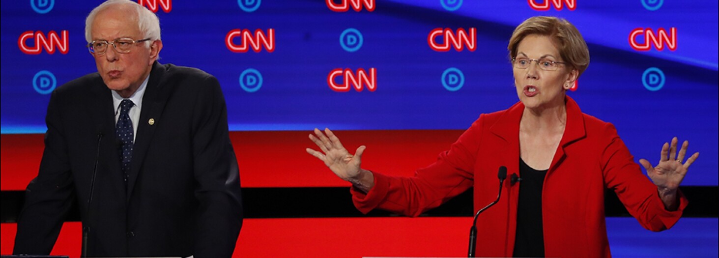 Sen. Bernie Sanders, I-Vt., and Sen. Elizabeth Warren, D-Mass., participate in the first of two Democratic presidential primary debates hosted by CNN Tuesday, July 30, 2019, in the Fox Theatre in Detroit.